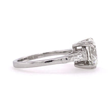 Round Brilliant Cut Diamond Ring with Baguettes