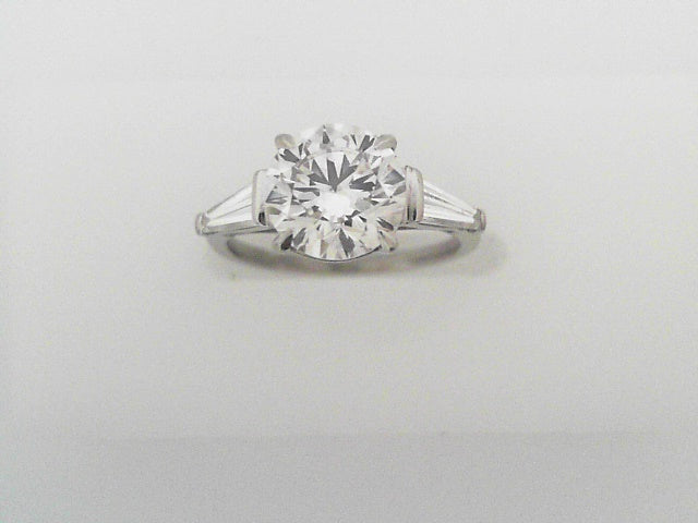 Round Brilliant Cut Diamond Ring with Tapered Baguettes