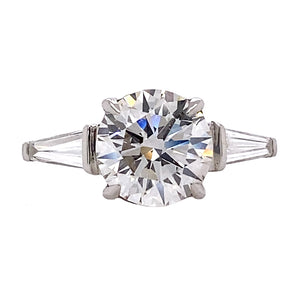 Round Brilliant Cut Diamond Ring with Tapered Baguettes