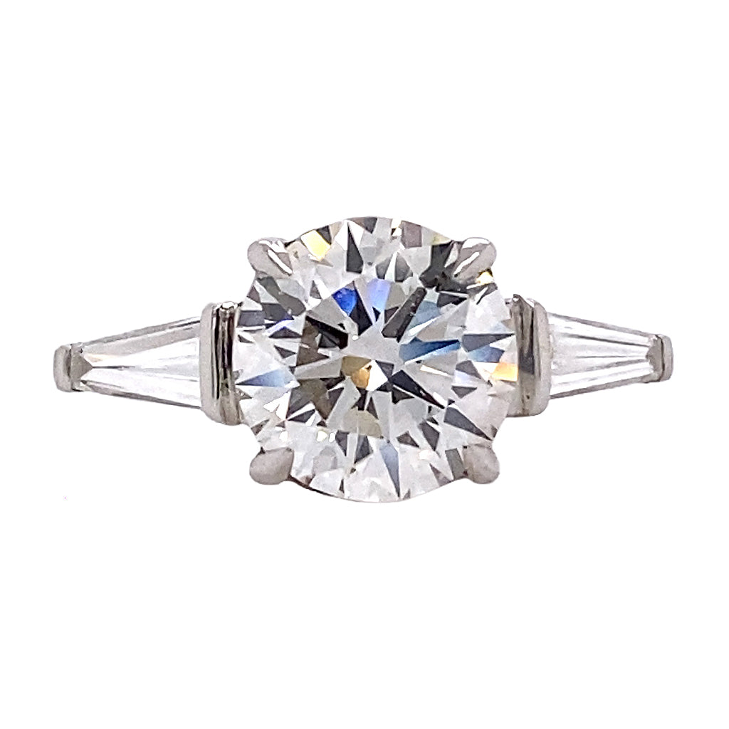 Round Brilliant Cut Diamond Ring with Tapered Baguettes