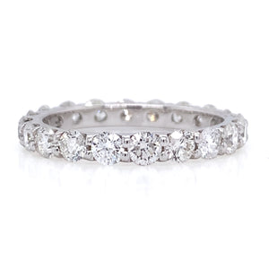 Round Diamond Eternity Band from jewelry shop Pageo Fine Jewelers.