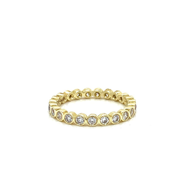 Yellow gold bezel ring from Pageo's online jewelry shop.